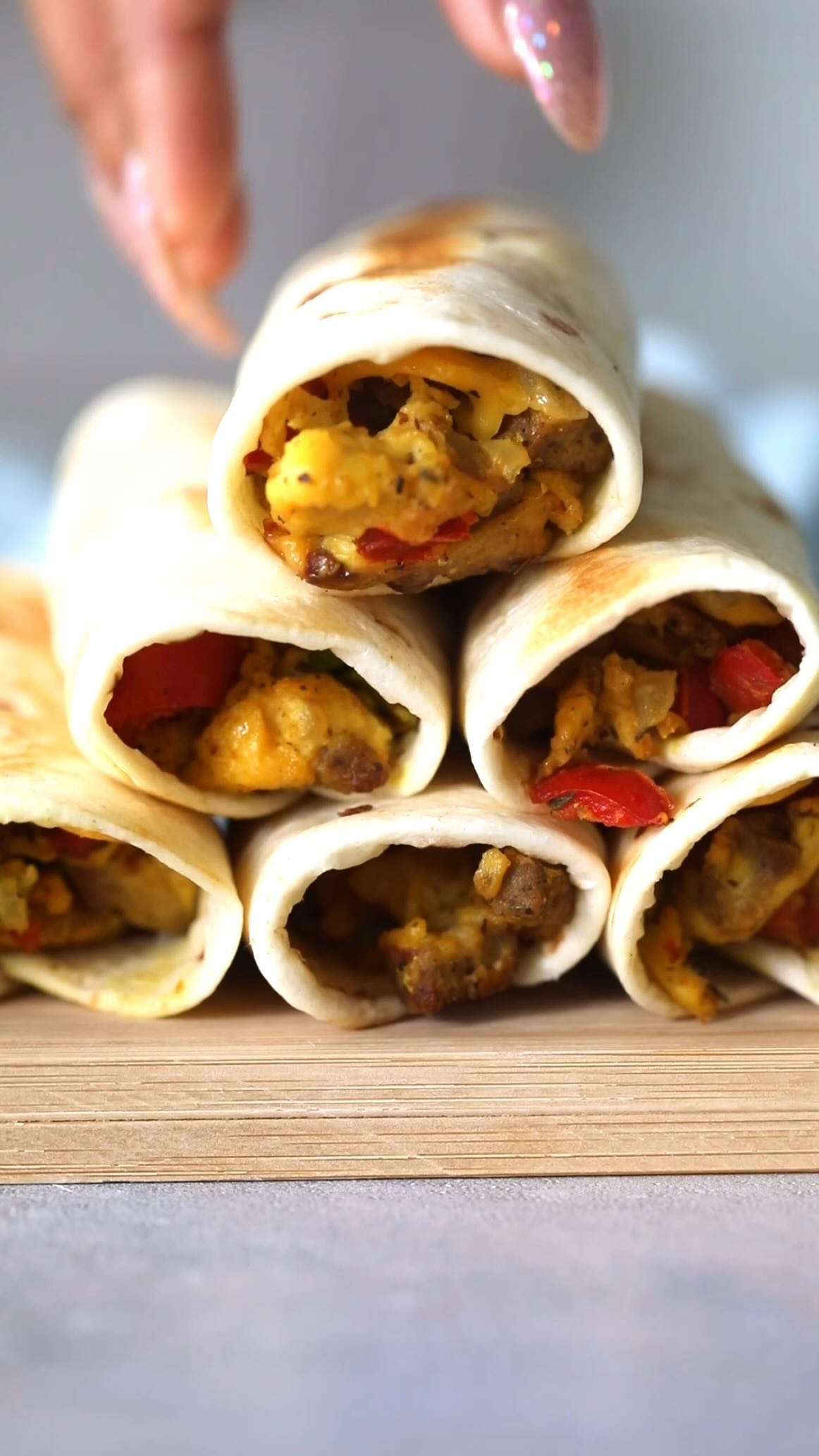 Y’all, these Breakfast Taquitos were sooooo good! 🙌🏾 Would you try them? | AD
P.S. You can watch me make them in my stories! Hurry before they disappear!
➡️ Tap “view shop” to get the ingredients for this recipe delivered to your house (first order is FREEEEE!)
✨RECIPE✨
Ingredients:
• 6 oz @justegg
• 1/4 red onion (diced)
• 1/2 green bell pepper (diced)
• 1/2 red bell pepper (diced)
• Vegan breakfast sausage of your choice
• Vegan cheddar cheese to taste
• 6 small tortillas
• salsa for dipping (optional)
Instructions: Cook vegan sausage patties according to package instructions. Once the sausage patties have been cooked, chop into small pieces and set aside.
Add diced onions and bell peppers to an oiled pan and cook over medium heat until soft. Season to taste and stir frequently.
Add 6 oz. (about 1/2 bottle) of JUST Egg to the pan with the peppers and onions along with the chopped vegan sausage. Season to taste. Scramble until mixture is well combined and the JUST Egg has been cooked.
On a clean, flat surface lay out your tortillas and layer each with vegan cheese and the JUST Egg scramble (about 2 spoonfuls). Roll tightly,
then place back into the pan with the seams facing down.
Brown on both sides over medium heat. Once done,
remove from the pan and enjoy with salsa (optional)!