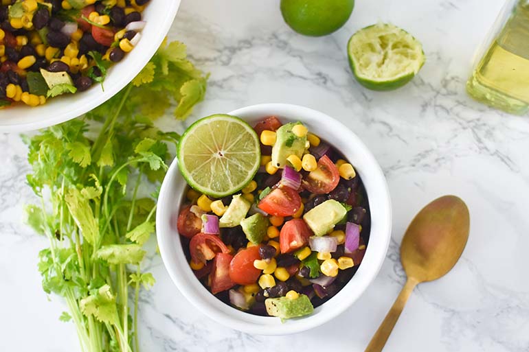 Avocado Black Bean Corn Salad in small white dish