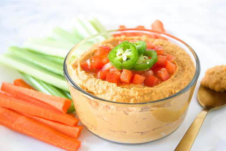 Buffalo Hummus Dip in a glass bowl