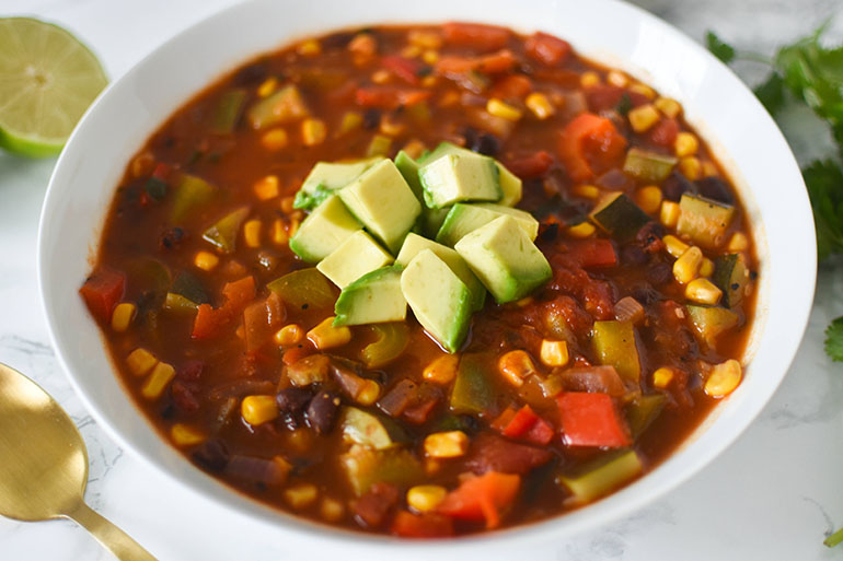 Vegan Tortilla Soup in white bowl