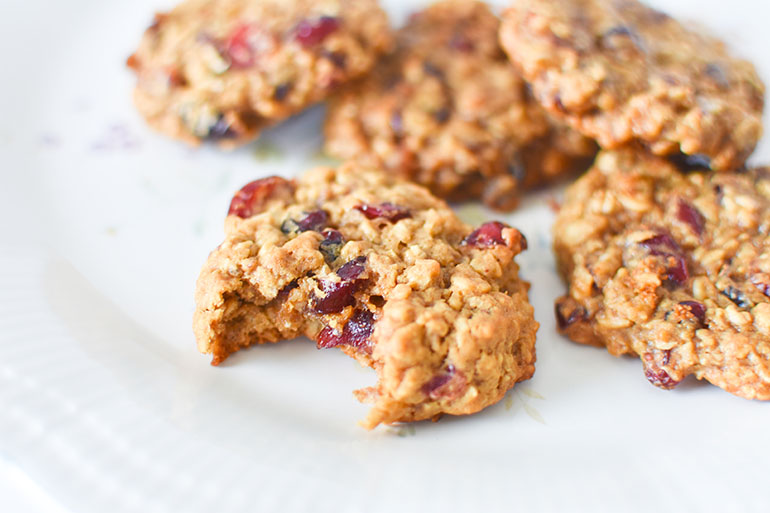 Vegan Cranberry Oatmeal Cookies with bite taken out