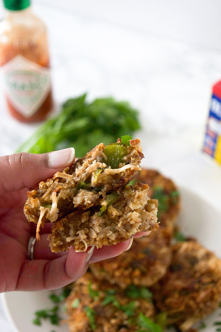 brown hands holding Vegan Jackfruit Crab Cakes 