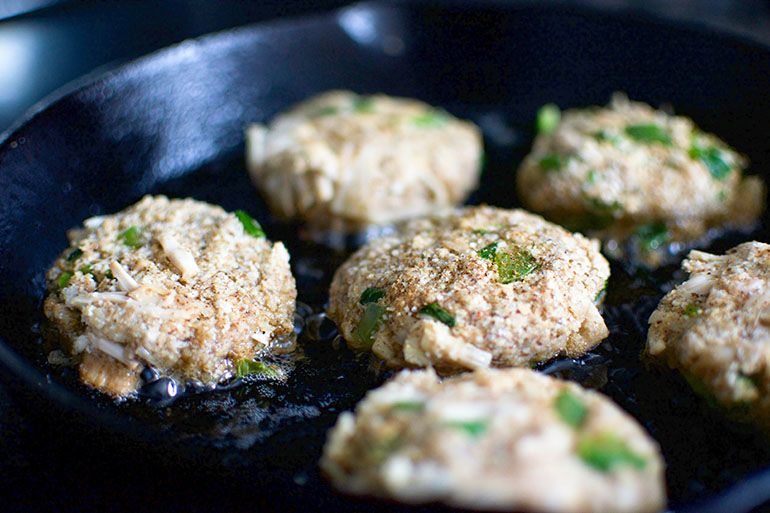 Vegan Jackfruit Crab Cakes in black pan