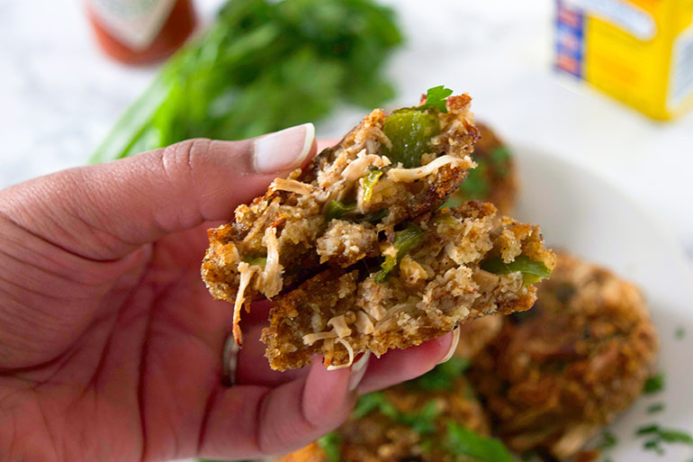 brown hand holding Vegan Jackfruit Crab Cakes