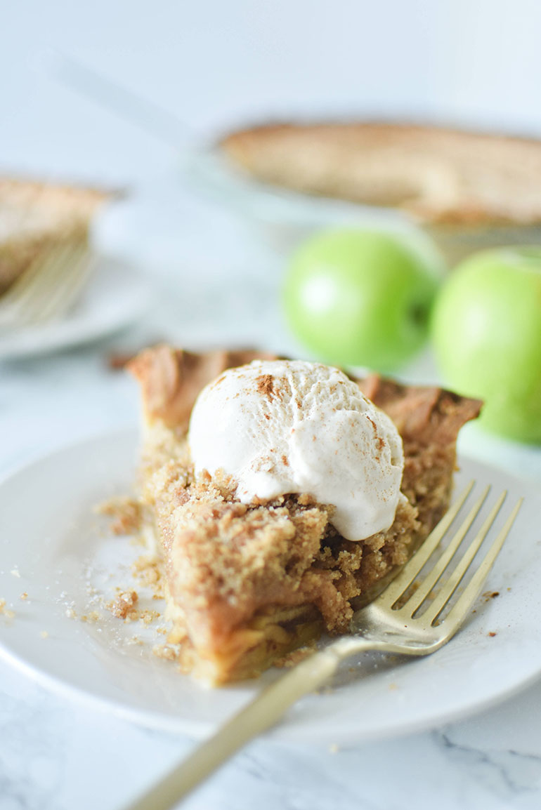 Vegan Apple Crumble Pie slice with ice cream