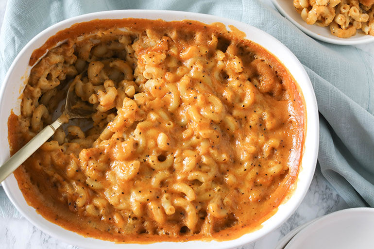 4 Cheese Vegan Baked Mac and Cheese with gold spoon