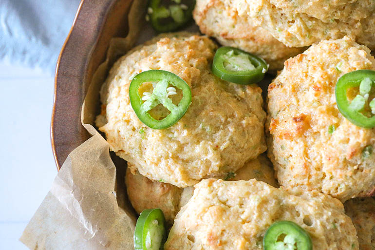 Vegan Jalapeño Cheddar Drop Biscuits in brown dish