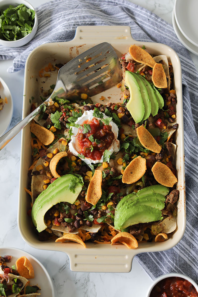 Vegan Taco Casserole with silver spatula