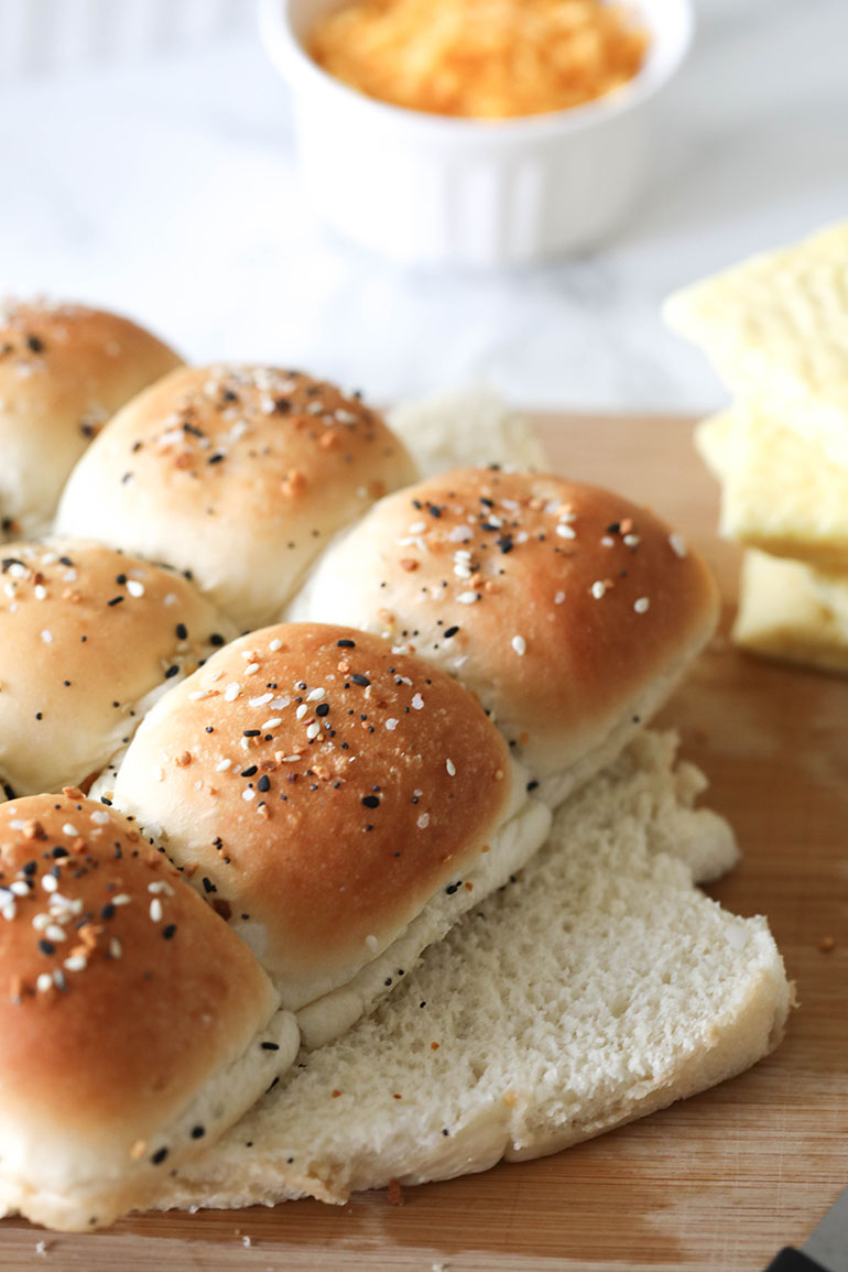 Yeast roll on wooden cutting board