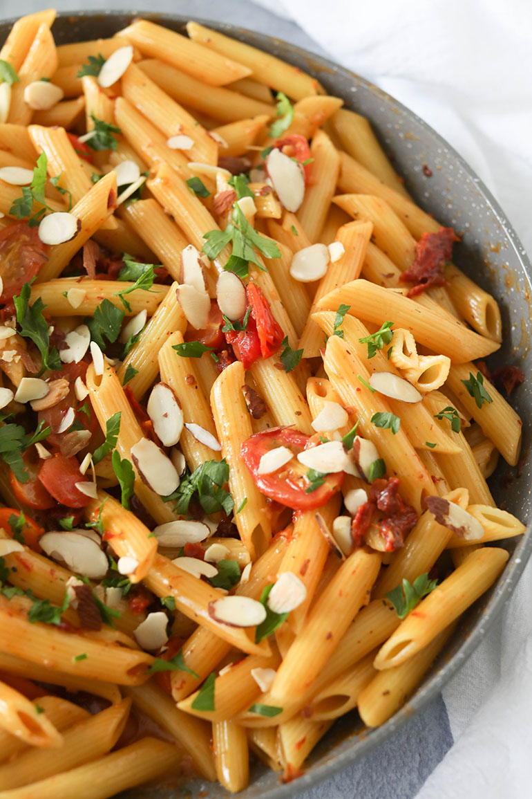 Vegan Sun Dried Tomato Pasta in gray pan