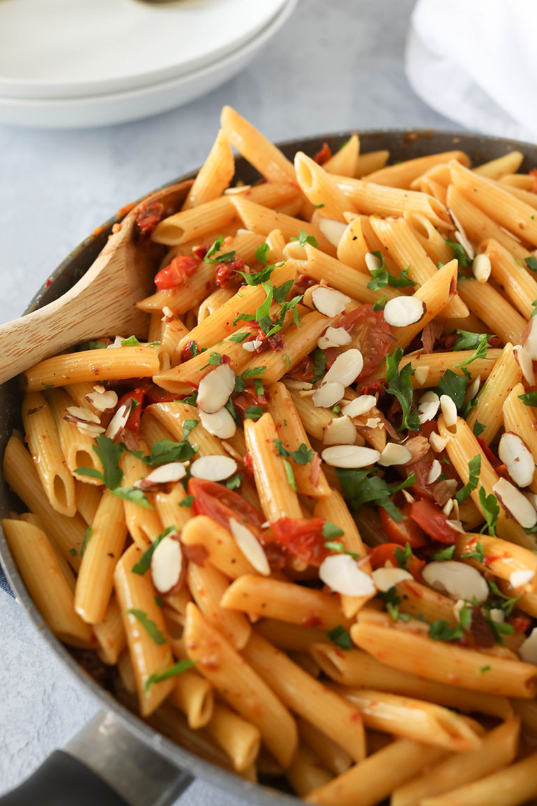 Vegan Sun Dried Tomato Pasta in gray pan