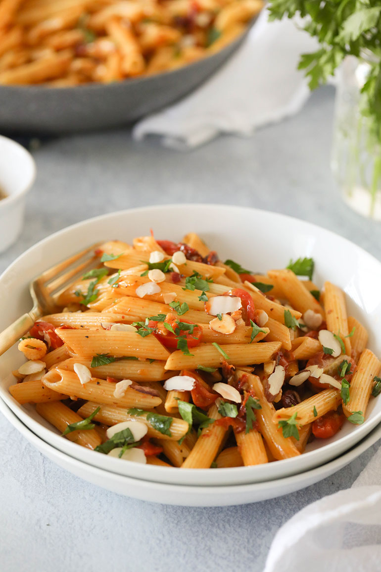 Vegan Sun Dried Tomato Pasta in white bowl