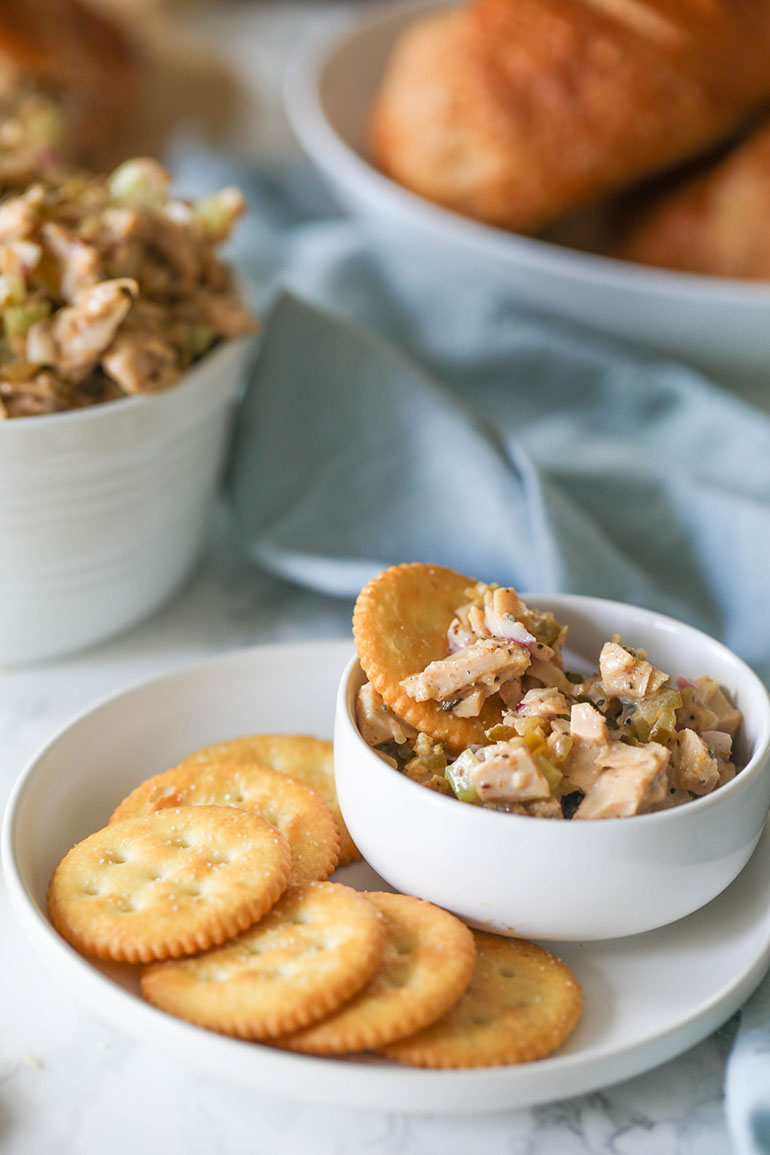 Vegan Chicken Salad with crackers on white plate