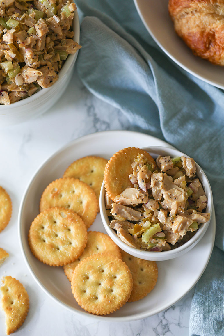 Vegan Chicken Salad with crackers on white plate