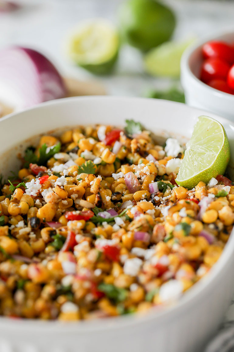 Vegan Corn Salad with Feta Cheese in white dish