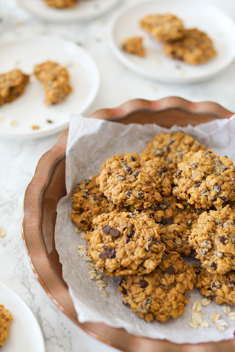 Vegan Pumpkin Chocolate Chip Oatmeal Cookies in round brown dish