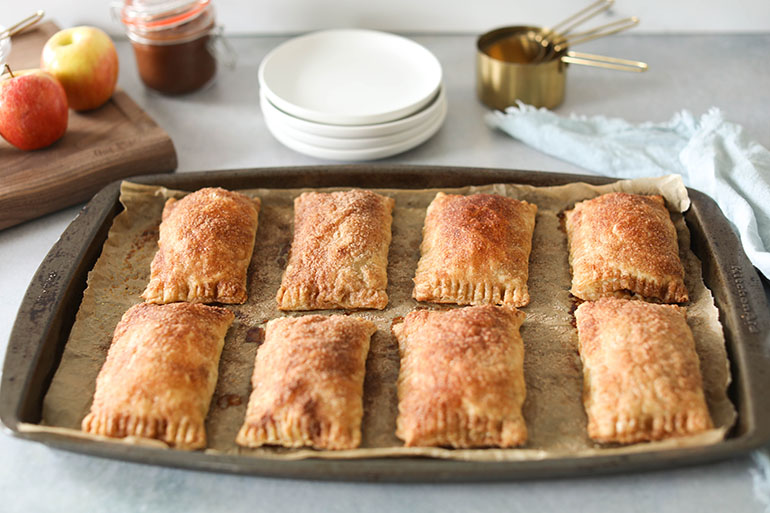 Easy Vegan Apple Butter Hand Pies on baking sheet