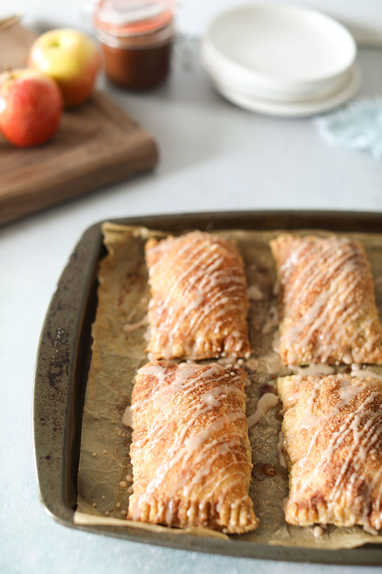 Easy Vegan Apple Butter Hand Pies on baking sheet