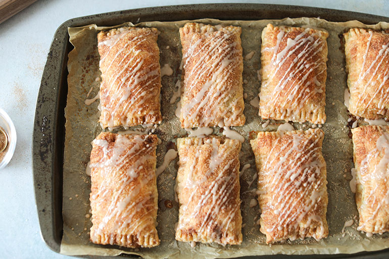 Easy Vegan Apple Butter Hand Pies on baking sheet