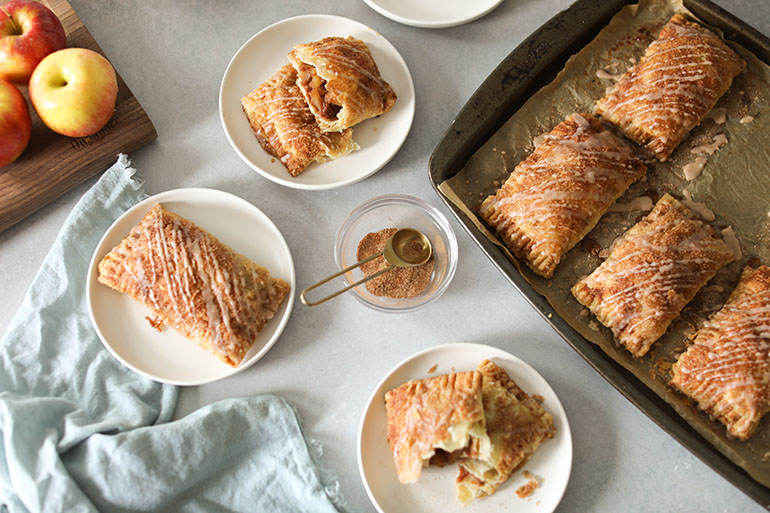Easy Vegan Apple Butter Hand Pies on white plates