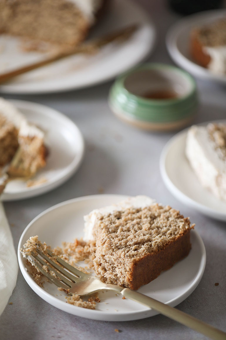 Sliced Vegan Gingerbread Loaf Cake on white plate